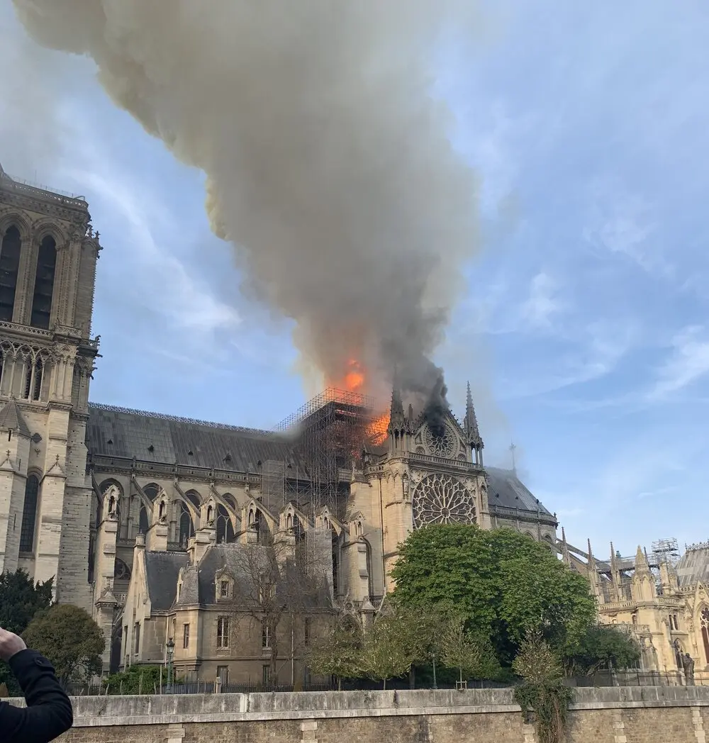 Notre Dame, a beautiful cathedral steeple burns in April 2019